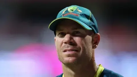 Getty Images David Warner wearing an Australia cap